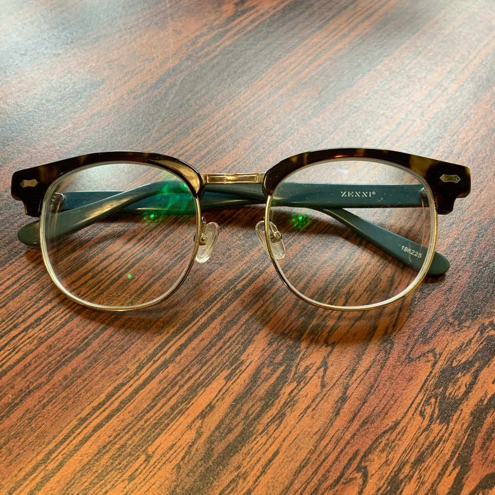 Rx tortoise shell horn rimmed lenses